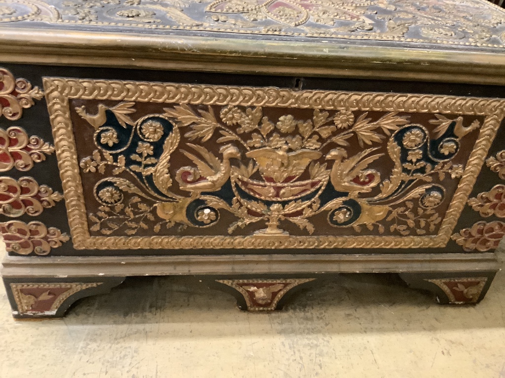 An ornate painted and gilt coffer, width 120cm depth 61cm height 68cm